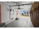 Inviting outdoor patio with string lights and fan, perfect for relaxing and entertaining near the beach at 2601 Gulf N Dr # 317, Bradenton Beach, FL 34217