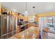 Modern kitchen with stainless steel appliances, granite countertops, and ample cabinet space at 28442 Coco Palm Dr, Punta Gorda, FL 33982