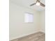 Bright bedroom featuring wood-look floors and a modern ceiling fan for added comfort at 301 89Th Ne Ave, St Petersburg, FL 33702