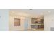 Bright and open living space connecting to the updated kitchen at 301 89Th Ne Ave, St Petersburg, FL 33702