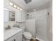 Modern bathroom featuring a glass-enclosed shower with white marble-look tile, and updated vanity at 340 Base E Ave # 314, Venice, FL 34285