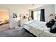 Bedroom featuring a bed, dresser, and view to balcony at 3559 Lake Bayshore Dr # J-204, Bradenton, FL 34205