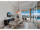 Elegant dining room with stylish furnishings and seamless access to the outdoor pool area at 508 Blue Shell Loop, Sarasota, FL 34240