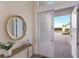 Bright foyer with views of the paved driveway and water feature at 508 Blue Shell Loop, Sarasota, FL 34240
