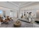 Spacious living room features modern furniture and open layout, perfect for entertaining guests at 508 Blue Shell Loop, Sarasota, FL 34240