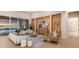 Inviting living area with a modern seating arrangement, stylish decor, and great waterfront views at 508 Blue Shell Loop, Sarasota, FL 34240