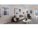 Bright living room featuring modern furniture, stylish decor, and natural light at 508 Blue Shell Loop, Sarasota, FL 34240