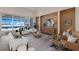 Comfortable living room with water view, plush seating, and stylish decor at 508 Blue Shell Loop, Sarasota, FL 34240