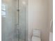 Modern walk-in shower featuring glass enclosure, neutral tile, and contemporary fixtures at 508 Blue Shell Loop, Sarasota, FL 34240