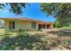 Large backyard of home with mature trees, providing privacy and shade at 5168 Cillette Ave, North Port, FL 34288