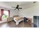 Bedroom with ceiling fan, hardwood flooring and natural light at 5168 Cillette Ave, North Port, FL 34288