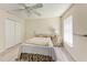 Bedroom with wood-look flooring, ceiling fan and closet at 5168 Cillette Ave, North Port, FL 34288