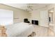 Bedroom with ceiling fan, window, and modern flooring at 5168 Cillette Ave, North Port, FL 34288