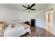 Bedroom with hardwood flooring and bright lighting at 5168 Cillette Ave, North Port, FL 34288