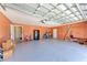 Spacious garage with overhead lighting, shelving, and plenty of room for storage at 5168 Cillette Ave, North Port, FL 34288