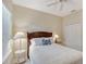Comfortable bedroom featuring a ceiling fan, neutral decor and closet at 5238 Aqua Breeze Dr, Bradenton, FL 34208