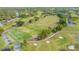 Expansive aerial view of the community's beautifully maintained golf course at 5269 Wedgewood Ln # 36, Sarasota, FL 34235