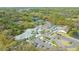 Aerial shot of The Meadows Country Club with pool, tennis courts, and parking at 5269 Wedgewood Ln # 36, Sarasota, FL 34235