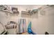 Walk-in closet with ample shelving, some household items, and decor at 5269 Wedgewood Ln # 36, Sarasota, FL 34235