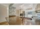 Modern kitchen features designer wallpaper, stainless steel appliances, and updated countertops at 5269 Wedgewood Ln # 36, Sarasota, FL 34235