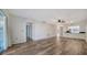 Bright living room features updated flooring and an open floor plan at 5269 Wedgewood Ln # 36, Sarasota, FL 34235
