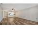 Bright, open-concept living space featuring hardwood floors and easy access to the kitchen at 5269 Wedgewood Ln # 36, Sarasota, FL 34235
