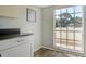 Charming pantry area with bright natural light and updated flooring and countertops at 5269 Wedgewood Ln # 36, Sarasota, FL 34235