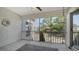 Outdoor screened-in patio provides a tranquil view of the lush garden at 5269 Wedgewood Ln # 36, Sarasota, FL 34235