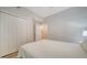 Bedroom with a double closet with a view to another closet at 5283 Descanso Ct # 101B18, Sarasota, FL 34238