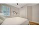 Bright bedroom with a window and double closet at 5283 Descanso Ct # 101B18, Sarasota, FL 34238