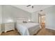 Comfortable bedroom with wood floors, and en-suite bathroom at 5283 Descanso Ct # 101B18, Sarasota, FL 34238