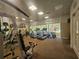 Well-equipped fitness center with treadmills, elliptical machines, and weight training equipment at 5283 Descanso Ct # 101B18, Sarasota, FL 34238