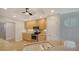 Well-equipped kitchen has stainless appliances, granite counters, and wood cabinets at 5283 Descanso Ct # 101B18, Sarasota, FL 34238