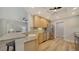 Spacious kitchen featuring stainless steel appliances, a breakfast bar and ample counter space at 5283 Descanso Ct # 101B18, Sarasota, FL 34238