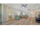 Bright living room offers generous seating, modern flooring and recessed lighting at 5283 Descanso Ct # 101B18, Sarasota, FL 34238