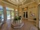 Beautiful lobby area leading to the community gathering room and a view of the outdoor pool at 5283 Descanso Ct # 101B18, Sarasota, FL 34238