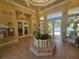 Elegant lobby area with stylish decor, leading to the fitness center and other community amenities at 5283 Descanso Ct # 101B18, Sarasota, FL 34238