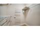Spacious walk-in closet with wire shelving for organized storage at 5283 Descanso Ct # 101B18, Sarasota, FL 34238