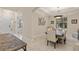 Formal dining area with table and seating for six, with views of the yard at 5503 Title Row Dr, Bradenton, FL 34210