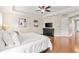 The primary bedroom features tray ceilings, hardwood flooring and a closet at 5503 Title Row Dr, Bradenton, FL 34210