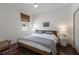 Bright bedroom with a ceiling fan, modern decor, and a beautiful rug at 5782 Sandy Pointe Dr, Sarasota, FL 34233