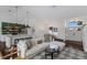Open floor plan to the kitchen and dining room at 5782 Sandy Pointe Dr, Sarasota, FL 34233
