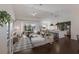 Open floor plan showcasing seamless flow to the backyard pool and kitchen at 5782 Sandy Pointe Dr, Sarasota, FL 34233