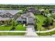 Gorgeous home with an expansive yard, complemented by a serene lake and lush greenery in a desirable community at 5978 Anise Dr, Sarasota, FL 34238