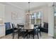 Inviting dining area featuring a round table, built-in bench seating, and natural light from the window at 5978 Anise Dr, Sarasota, FL 34238