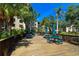 Inviting wooden deck area furnished with picnic tables and seating, perfect for outdoor community gatherings at 625 30Th W Ave # G210, Bradenton, FL 34205