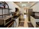 Modern kitchen with stainless steel appliances, granite countertops, and ample storage for culinary enthusiasts at 625 30Th W Ave # G210, Bradenton, FL 34205