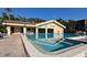 Bright pool area has lots of seating and a clear, clean blue pool at 625 30Th W Ave # G210, Bradenton, FL 34205