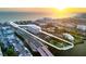 Stunning aerial view of the property highlighting its proximity to the beach, bay, and boat docks at 6415 Midnight Pass Rd # 204, Sarasota, FL 34242