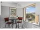 Cozy breakfast nook with seating for two and beautiful views of the outdoors at 6415 Midnight Pass Rd # 204, Sarasota, FL 34242
